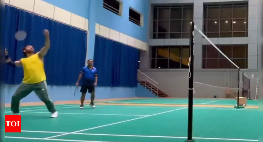 Fit as a fiddle: MS Dhoni’s jump smash on the badminton court is an absolute rocket – Watch | Cricket News